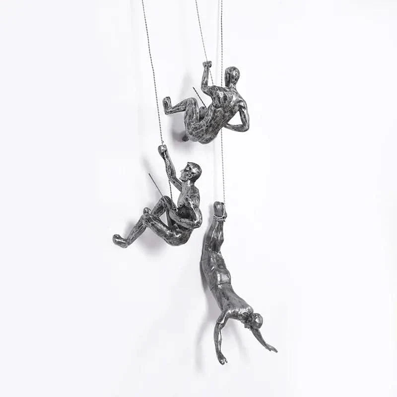 Scultura da Parete Uomo Scalatore – Arte Moderna in Resina
