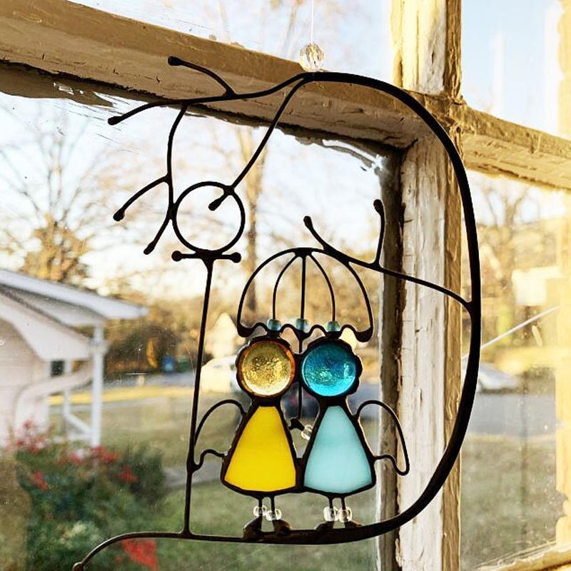 Decorazione in vetro colorato appesa per catturare il sole