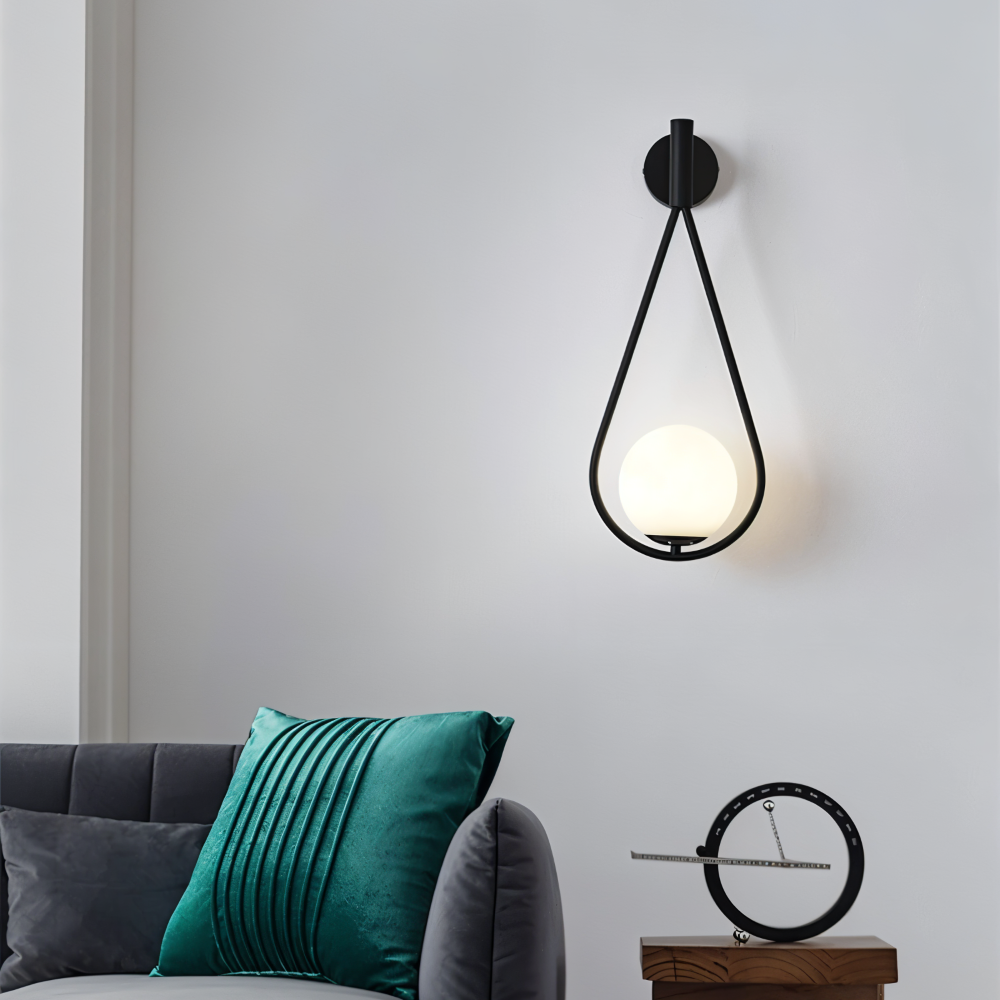 Luméa – Applique a forma di goccia in design di vetro con telaio metallico artistico