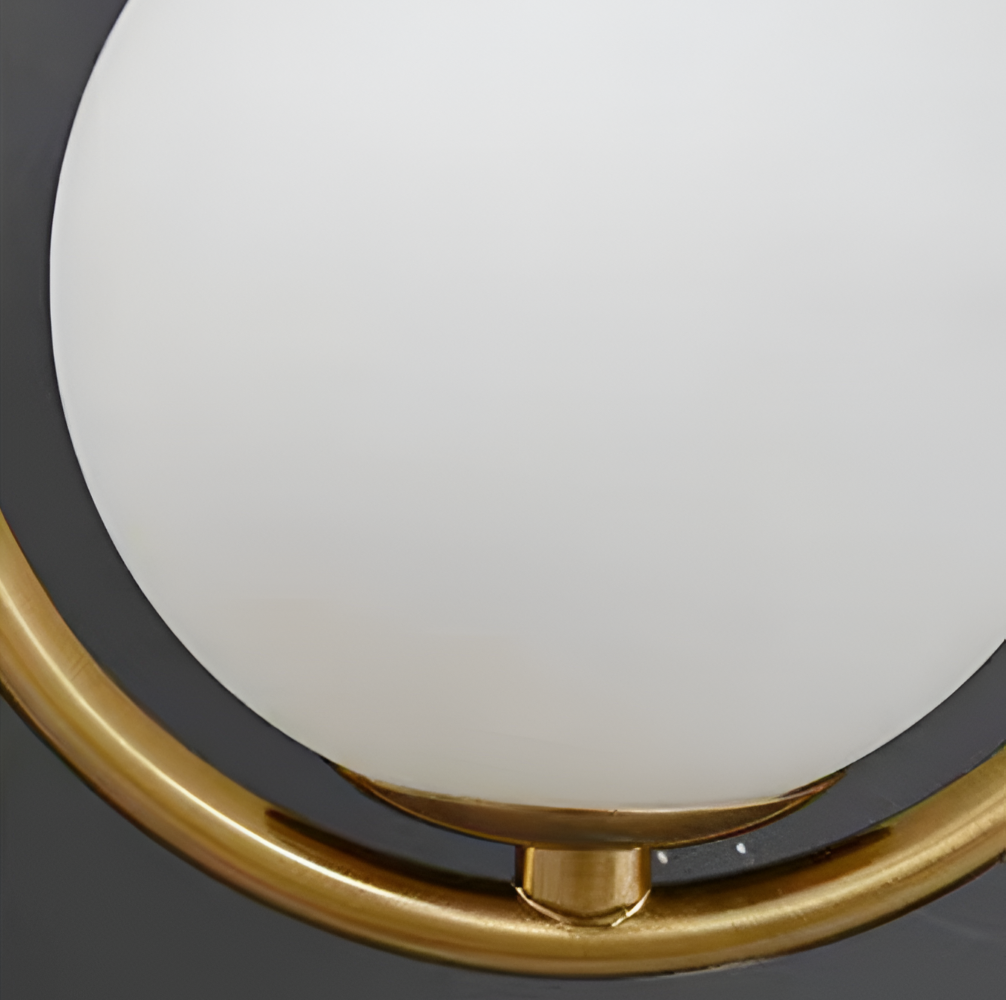 Luméa – Applique a forma di goccia in design di vetro con telaio metallico artistico