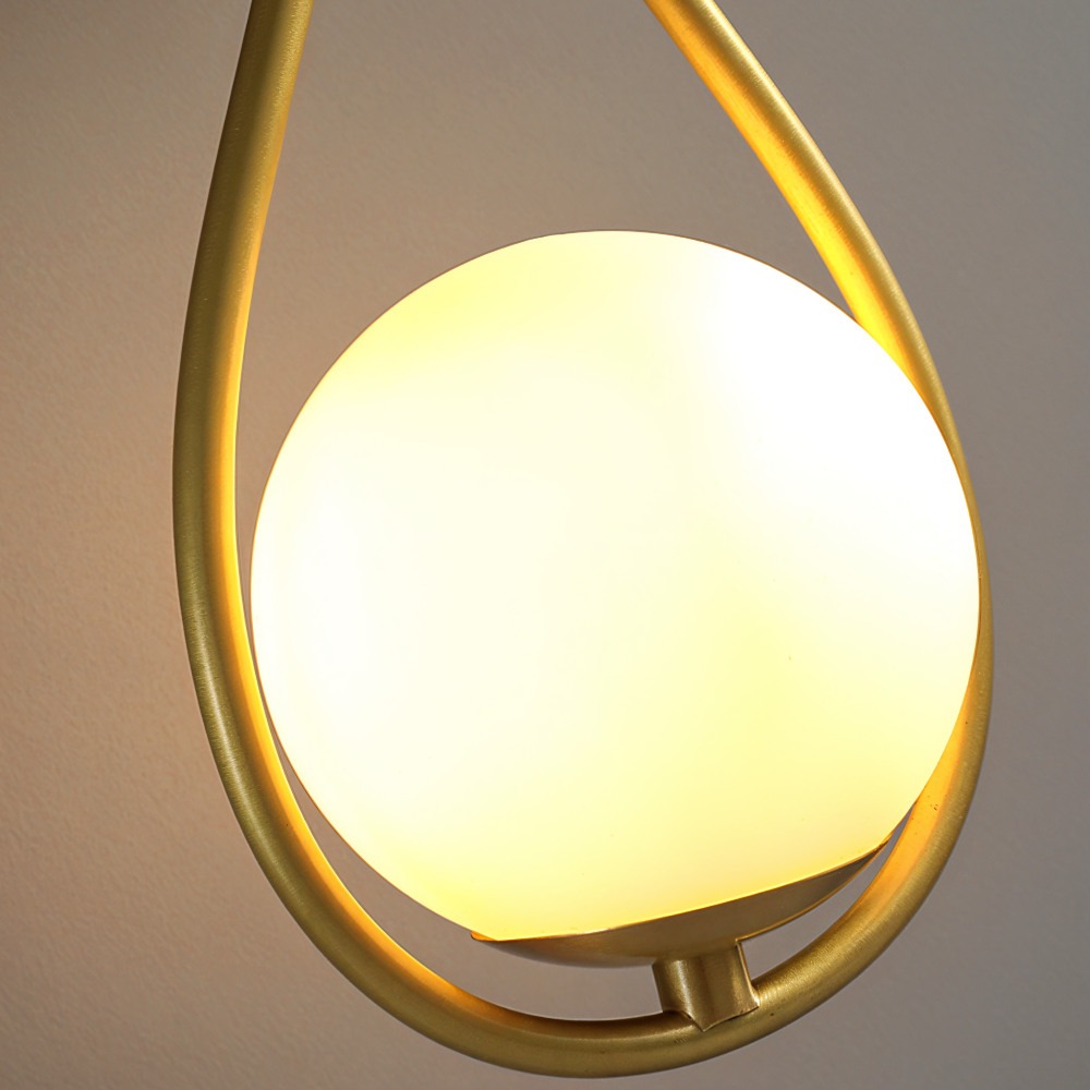 Luméa – Applique a forma di goccia in design di vetro con telaio metallico artistico