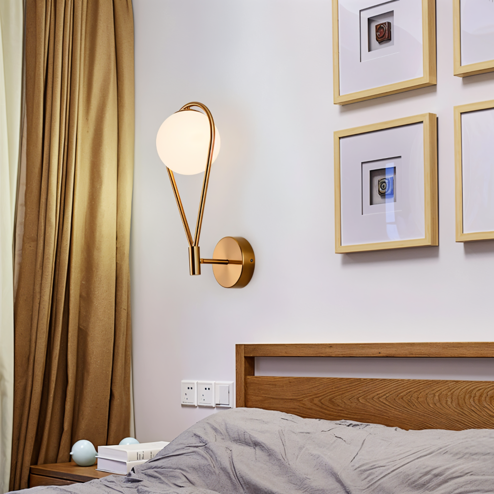 Luméa – Applique a forma di goccia in design di vetro con telaio metallico artistico