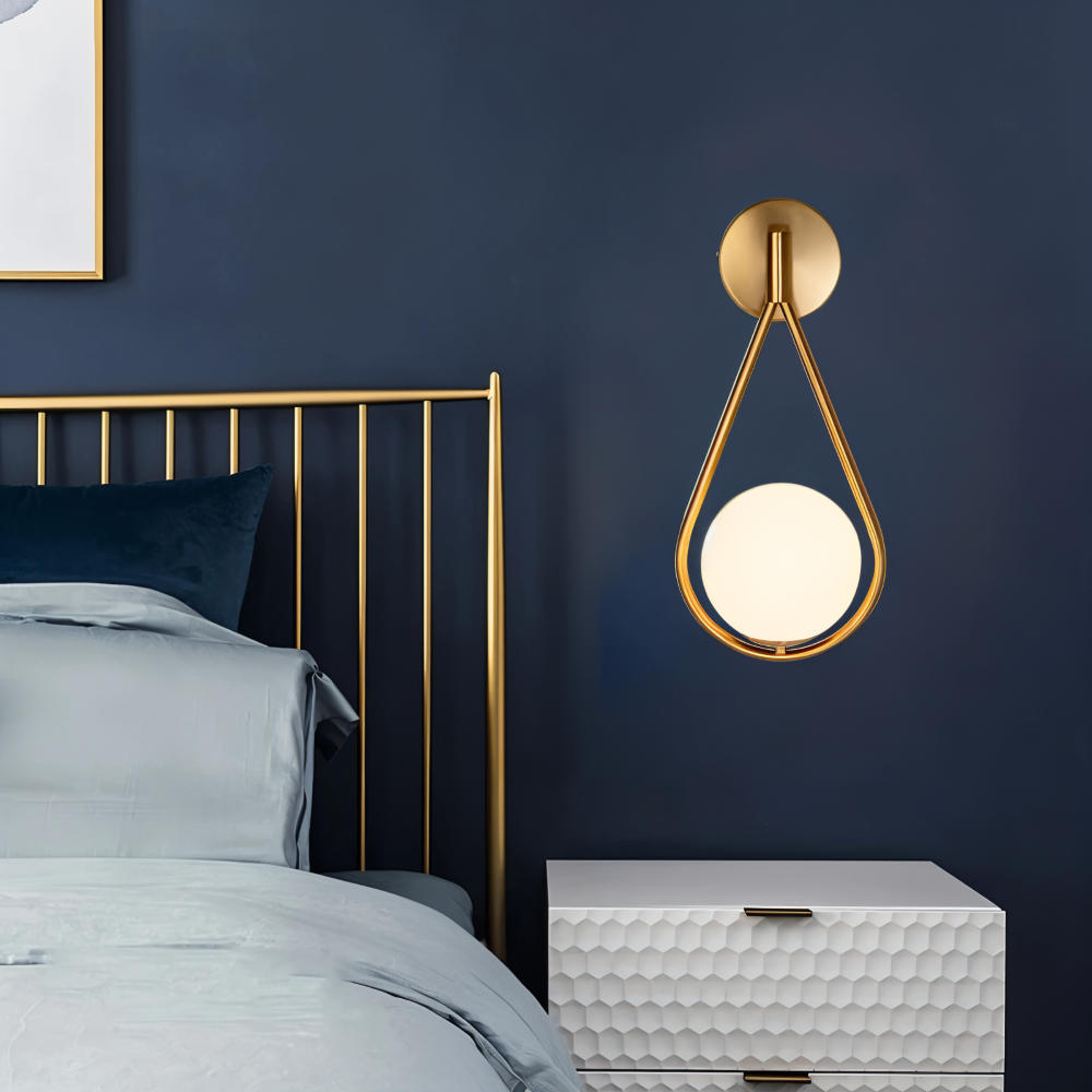 Luméa – Applique a forma di goccia in design di vetro con telaio metallico artistico