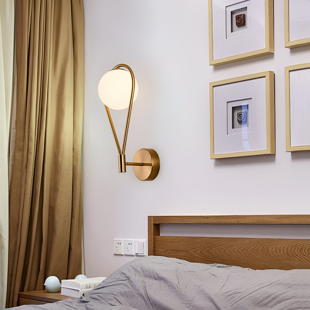 Luméa – Applique a forma di goccia in design di vetro con telaio metallico artistico