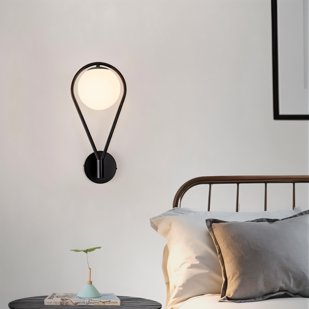 Luméa – Applique a forma di goccia in design di vetro con telaio metallico artistico