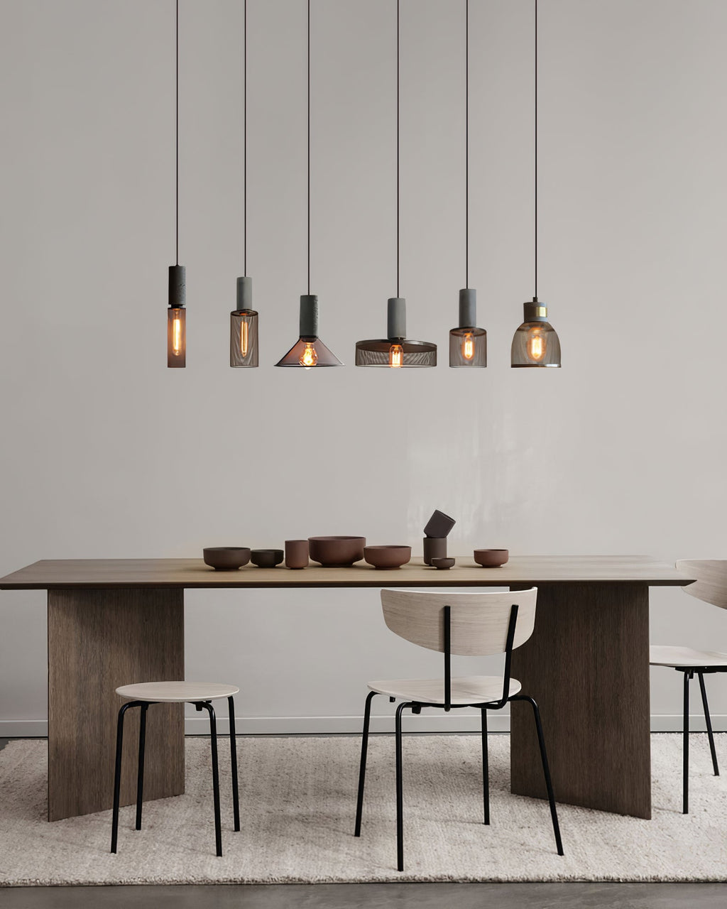 Virexo | Lampada a sospensione in cemento industriale con paralume cilindrico per interni moderni