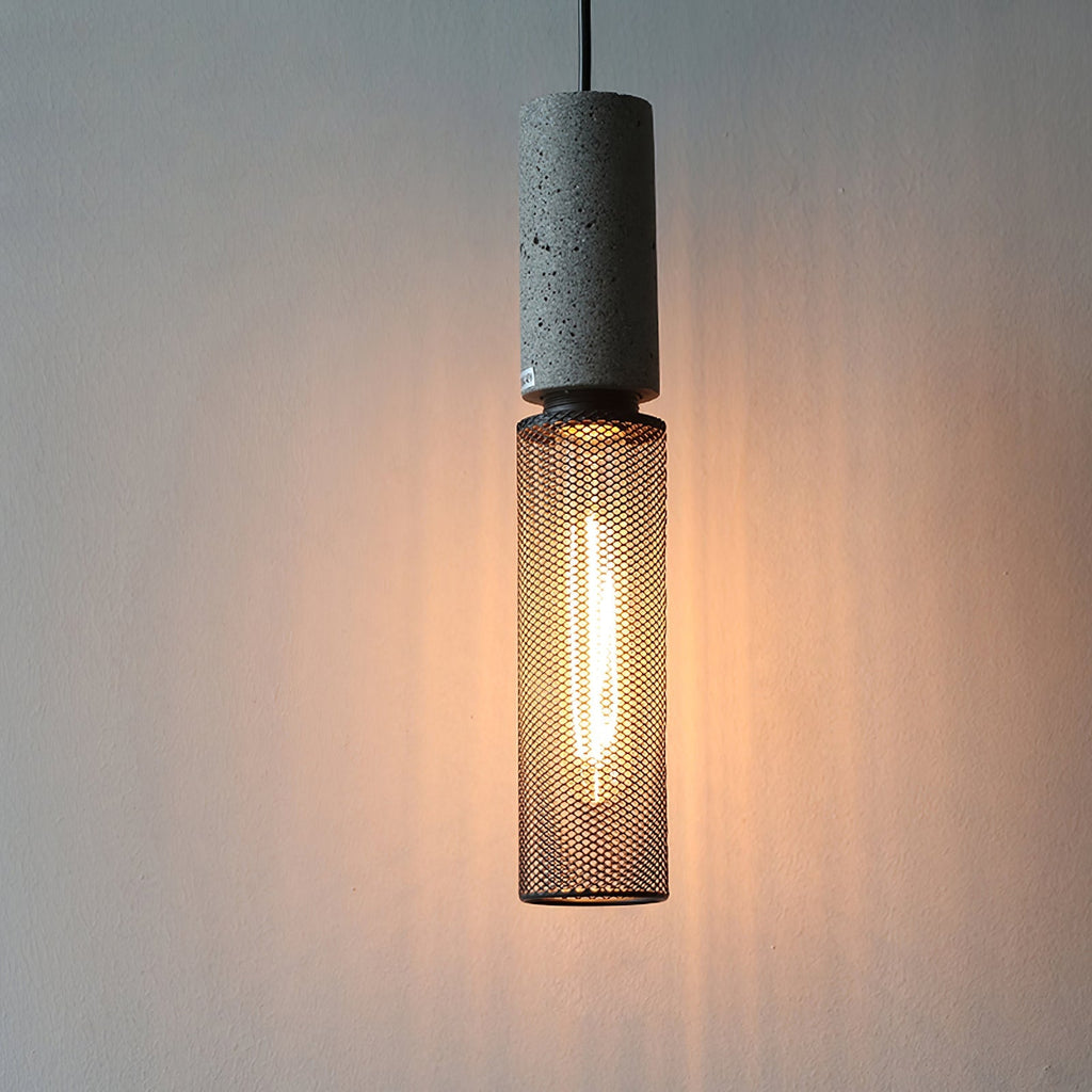 Virexo | Lampada a sospensione in cemento industriale con paralume cilindrico per interni moderni