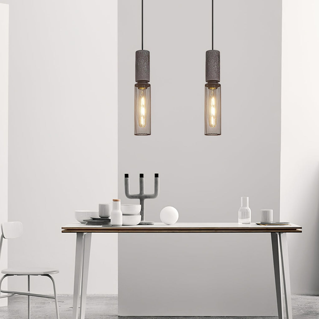 Virexo | Lampada a sospensione in cemento industriale con paralume cilindrico per interni moderni