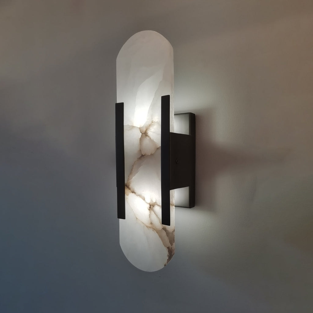 Applique da parete ovale in marmo con illuminazione ambientale LED soffusa