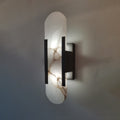 Applique da parete ovale in marmo con illuminazione ambientale LED soffusa
