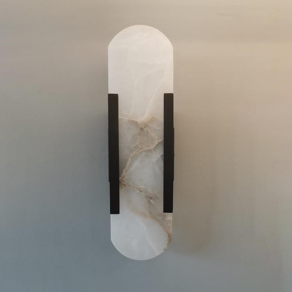 Applique da parete ovale in marmo con illuminazione ambientale LED soffusa