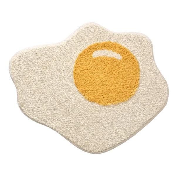 Tappeto a forma di uovo fritto