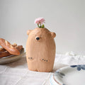 Deliziosa piccola vaso di fiori a forma di orso