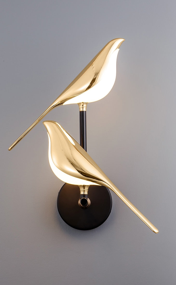 Moderna lampada da parete LED a forma di uccello
