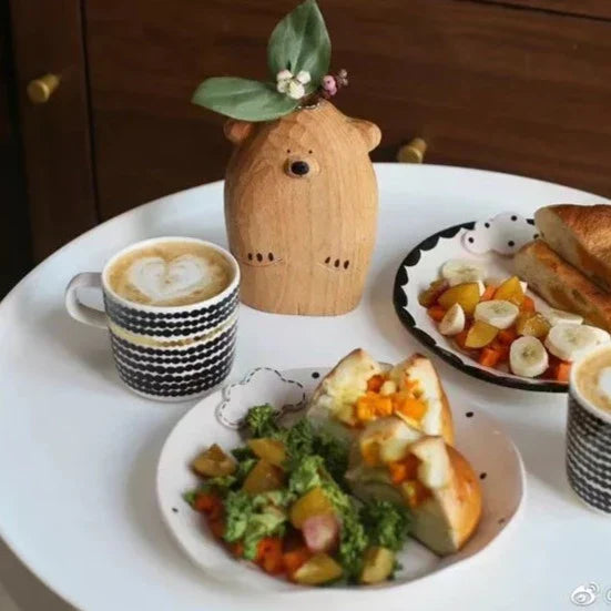 Deliziosa piccola vaso di fiori a forma di orso
