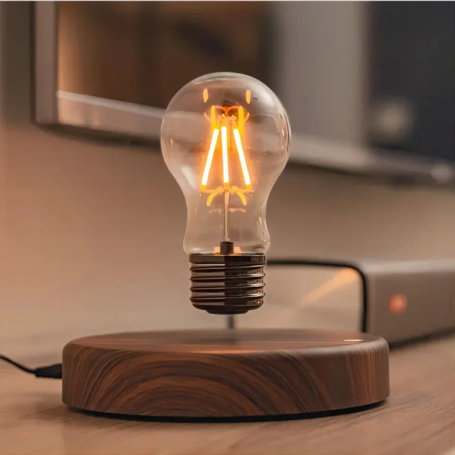 Lampadina sospesa con base in legno di noce - LevitaLux