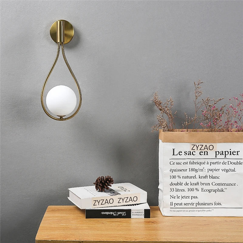 Elegante lampada da parete a goccia per uno stile senza tempo