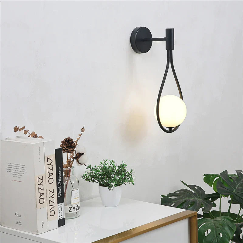 Elegante lampada da parete a goccia per uno stile senza tempo