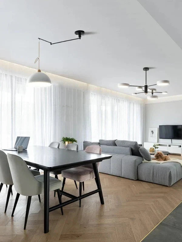 Lampada da soffitto moderna con bracci luminosi regolabili per un'illuminazione flessibile