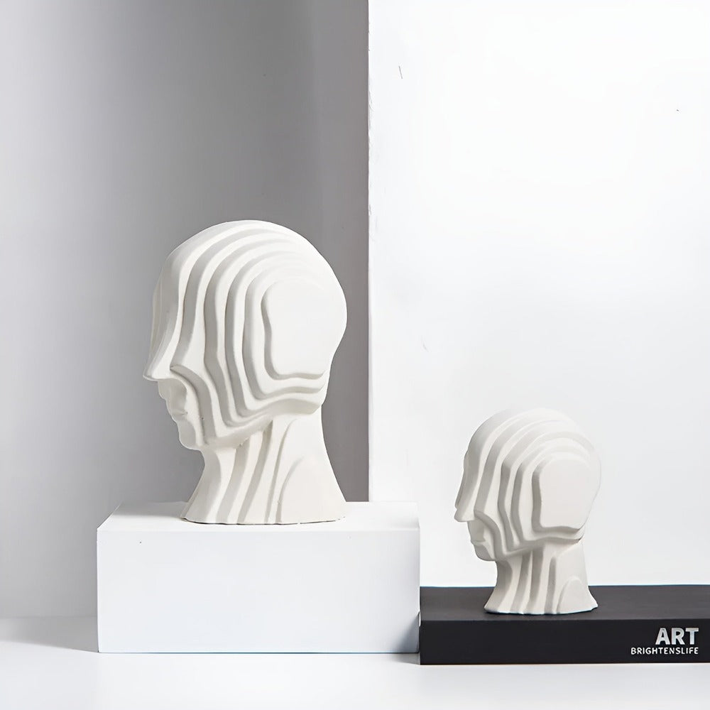 CosmoCrest – Busto in Ceramica Geometrica con Frange Dorate