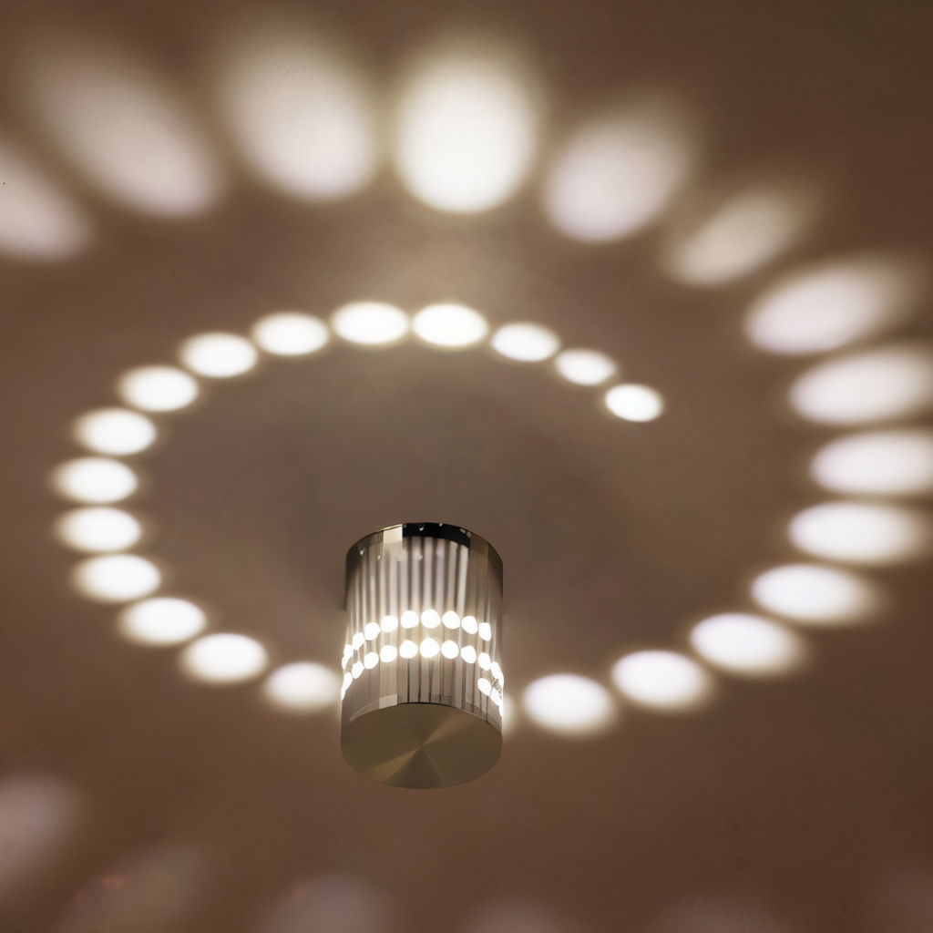 SpiraGlow – Lampada a Muro LED Cilindrica con Effetti Spiraliformi Colorati