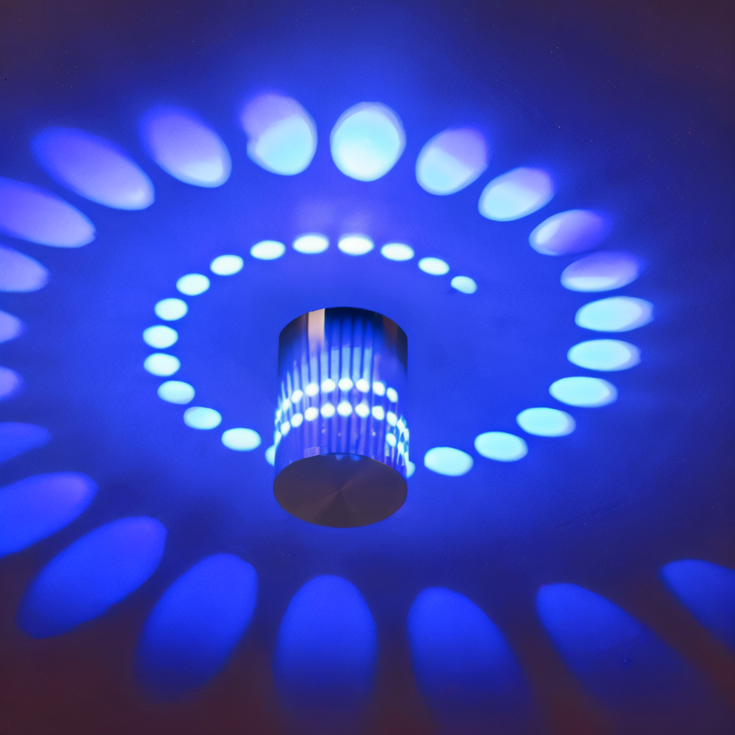 SpiraGlow – Lampada a Muro LED Cilindrica con Effetti Spiraliformi Colorati