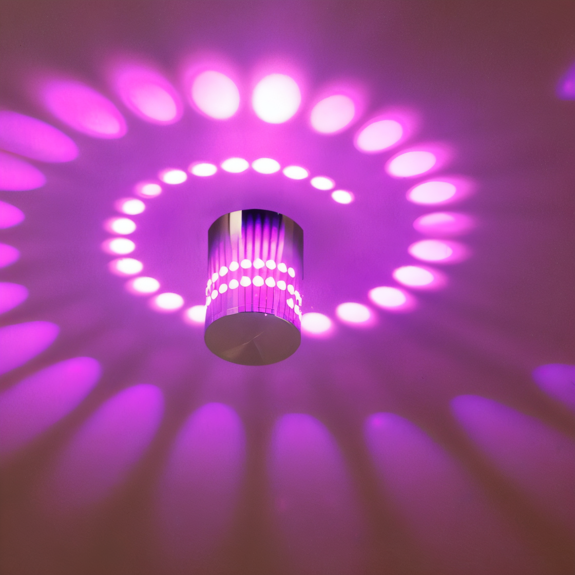 SpiraGlow – Lampada a Muro LED Cilindrica con Effetti Spiraliformi Colorati
