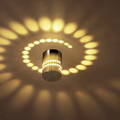 SpiraGlow – Lampada a Muro LED Cilindrica con Effetti Spiraliformi Colorati