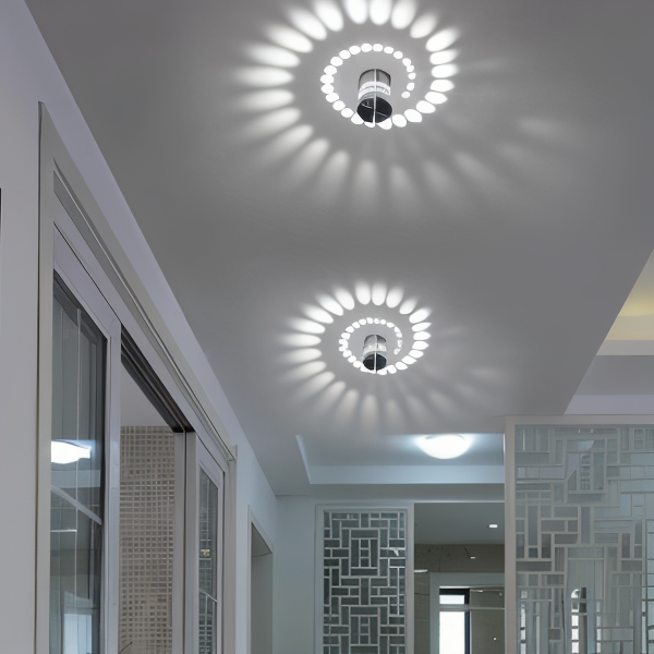 SpiraGlow – Lampada a Muro LED Cilindrica con Effetti Spiraliformi Colorati
