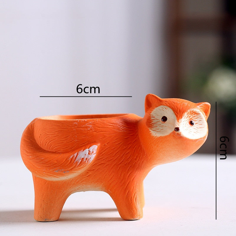Vaso per piante in ceramica con cartone di animali carini