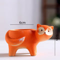 Vaso per piante in ceramica con cartone di animali carini