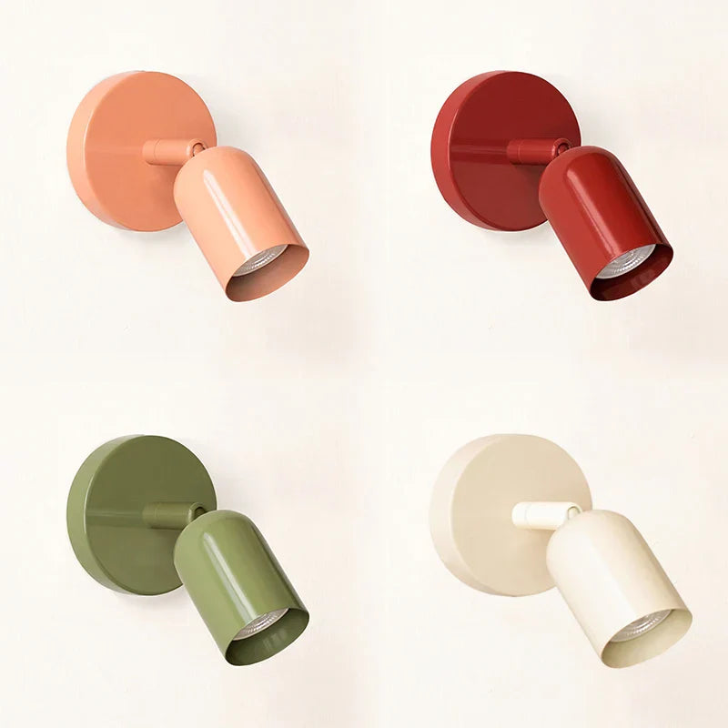 Lampada da parete Macaron elegante che offre un'illuminazione d'atmosfera
