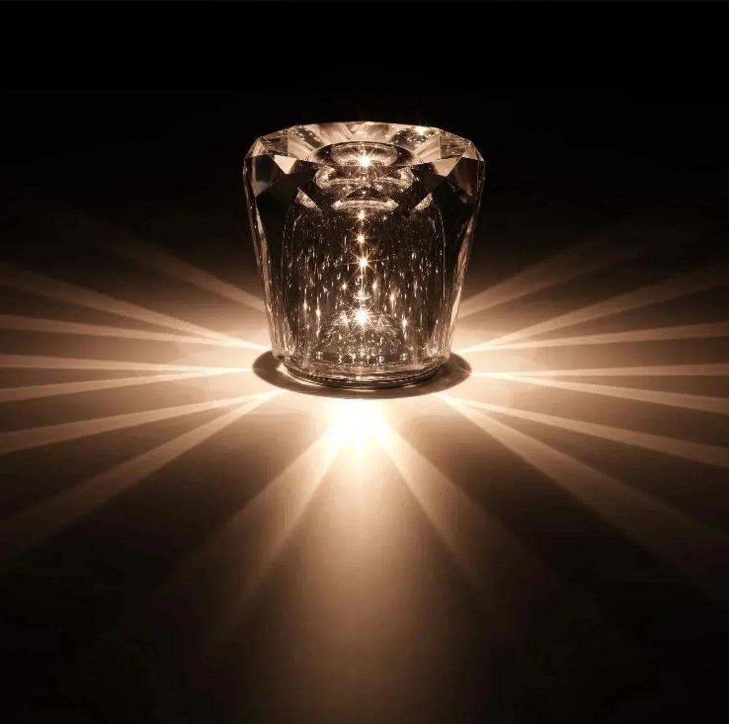 Luce esclusiva in metallo e cristallo