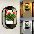 Lanterna da Parete Solare da Esterno con Vaso di Fiori Integrato e Sensore di Luce