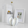 Vaso decorativo con struttura rigata