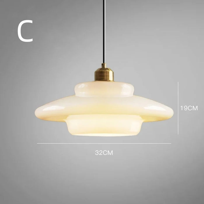 Elegant White Glass Pendant Light with Brass Fixture