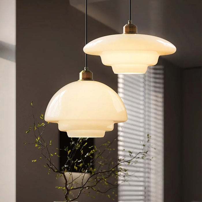 Elegant White Glass Pendant Light with Brass Fixture
