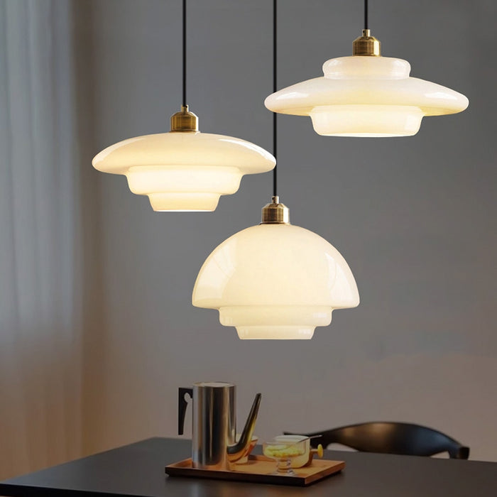 Elegant White Glass Pendant Light with Brass Fixture