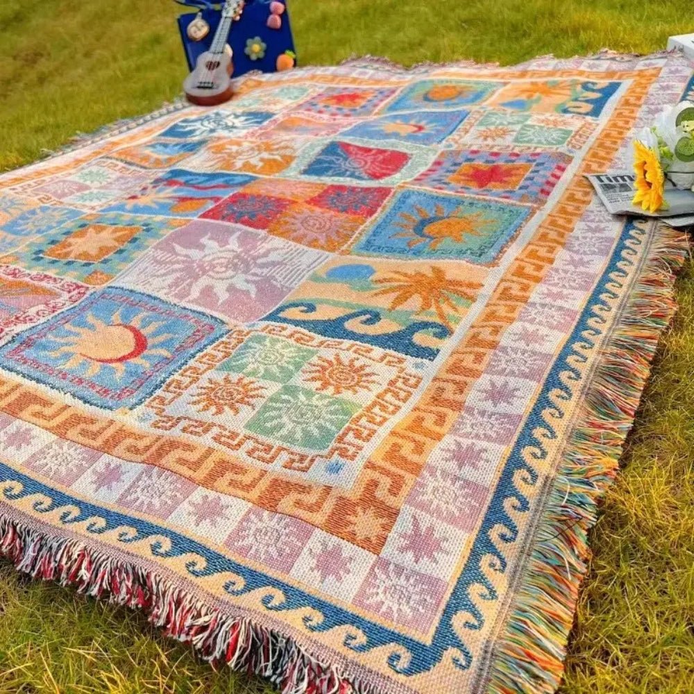Coperta da picnic intrecciata con motivo Boho-patchwork e frange