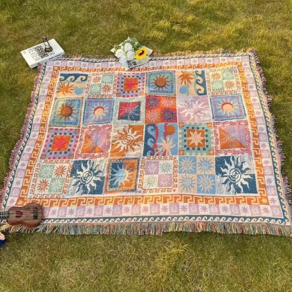 Coperta da picnic intrecciata con motivo Boho-patchwork e frange