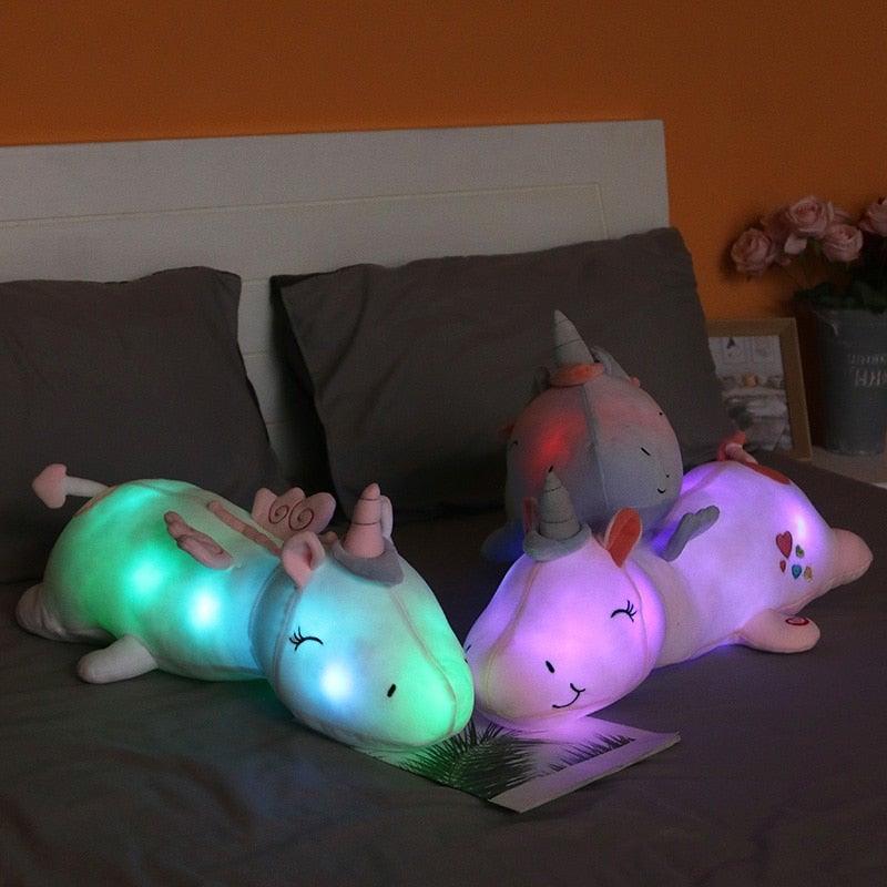 Giocattolo di peluche unicorno Lunacorn illuminato con LED arcobaleno per bambini