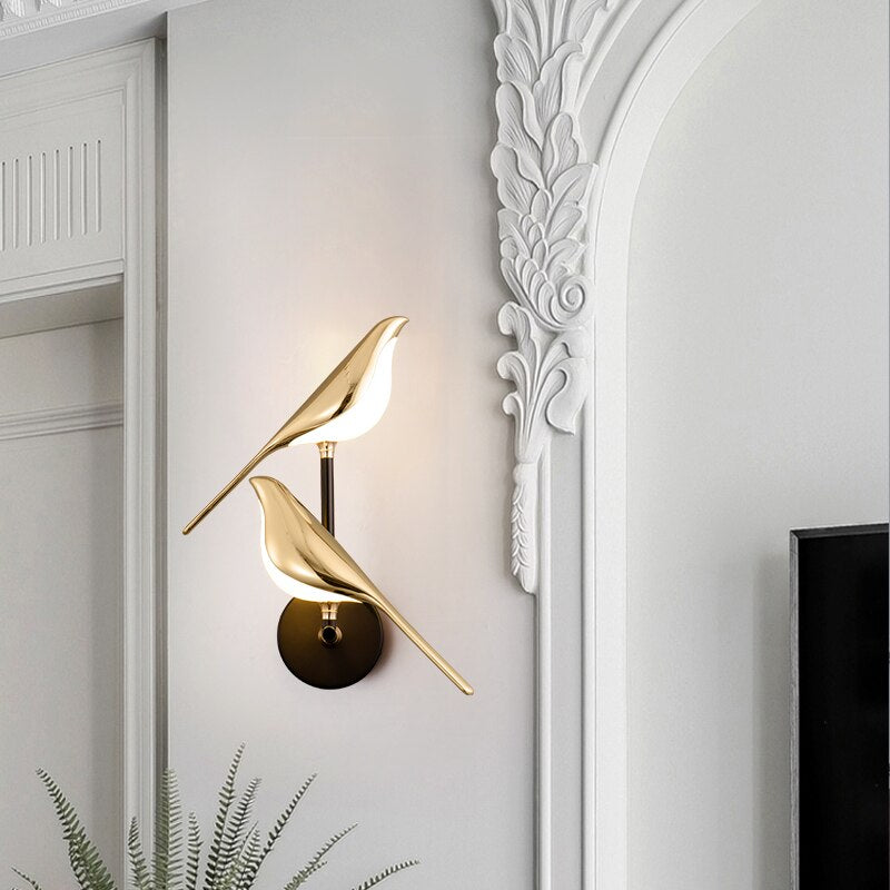 Moderna lampada da parete LED a forma di uccello