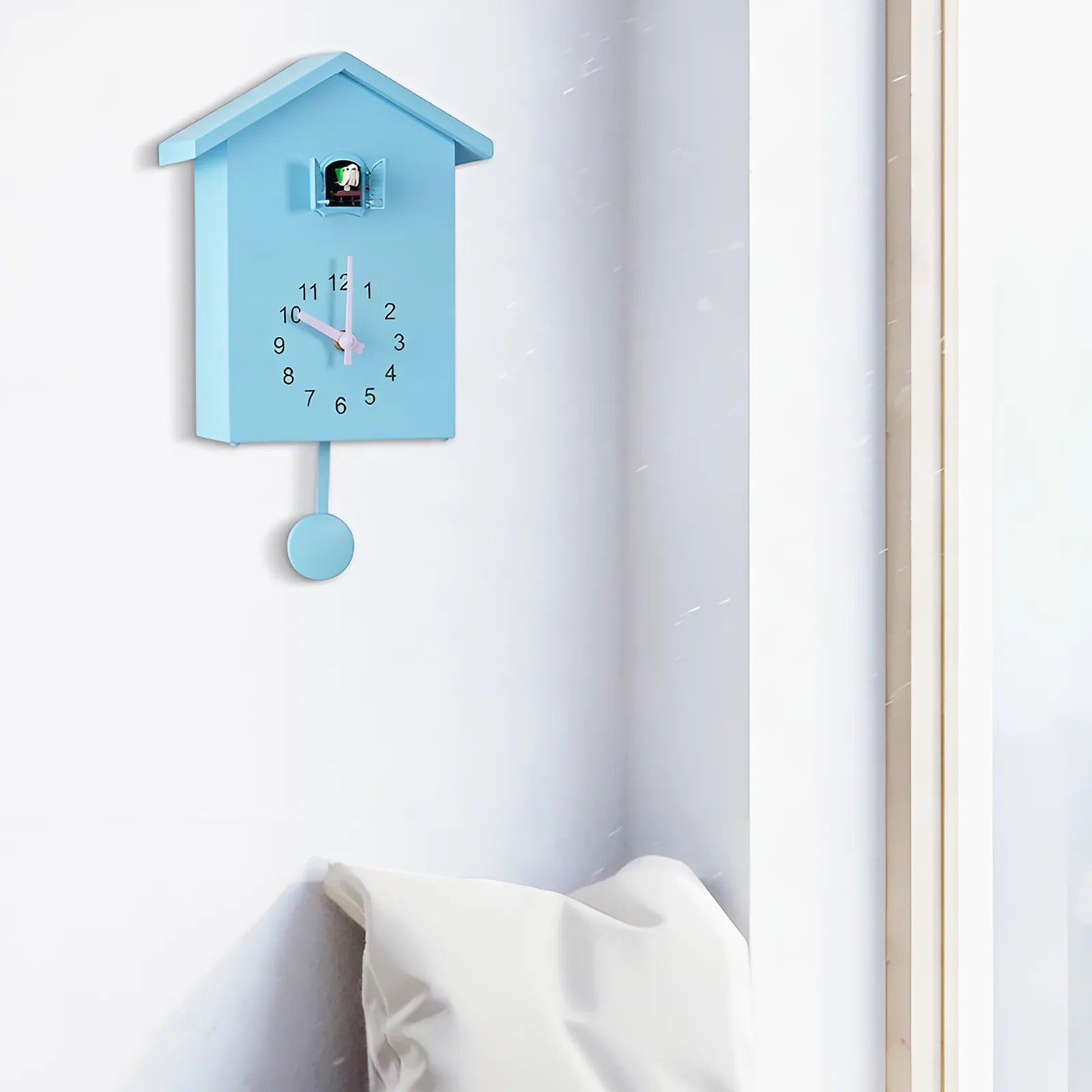 Minimalist Cuckoo Wall Clock in Sleek Black and White