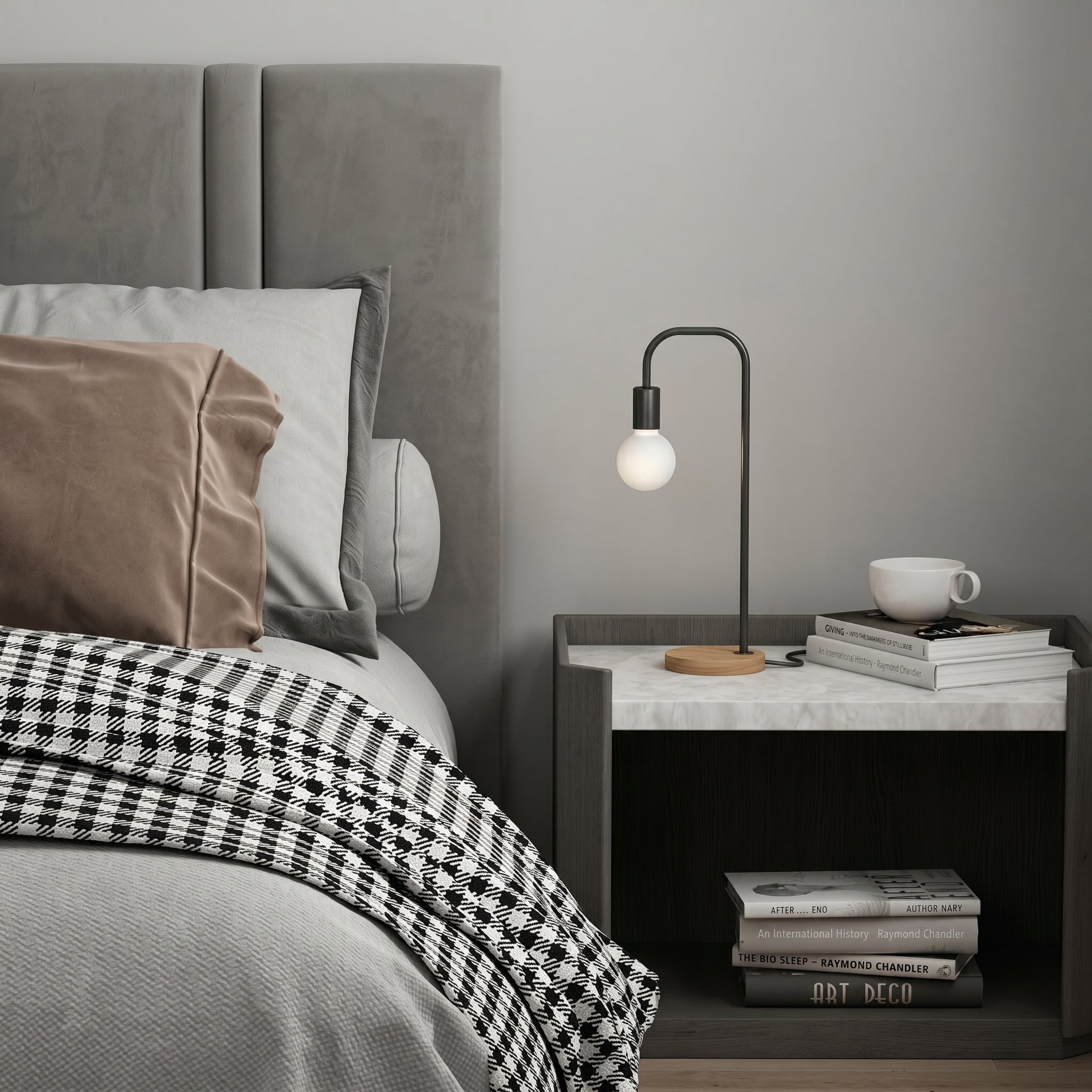 Lampada da tavolo minimalista con braccio in metallo curvo