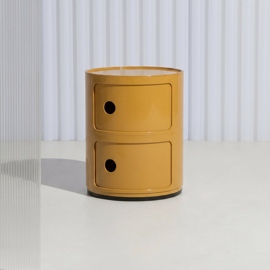 Comodino cilindrico con porte girevoli e scomparti